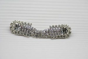 chiusura a clips con Swarovski